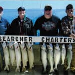 Fishermen showing their successful fishing charter